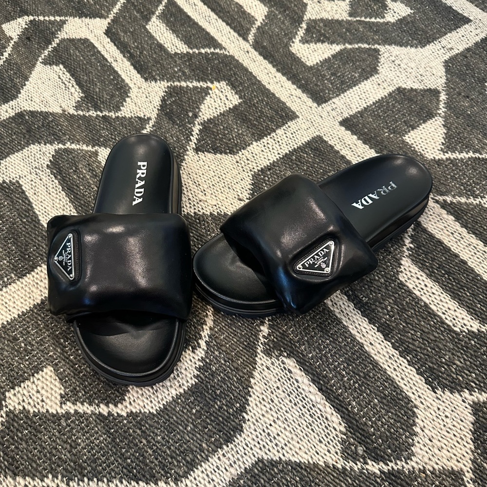 Prada soft padded nappa leather slides puff